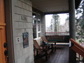 front porch w/rustic log columns and mahogany decking front porch w/rustic log columns and mahogany decking