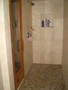 travertine shower w/pebble tile floor adj.sauna travertine shower w/pebble tile floor adj.sauna